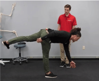 Assisted Hamstring Stretch - Muscle & Fitness
